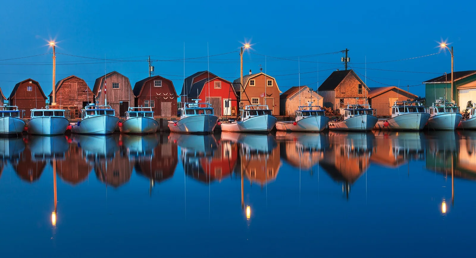 Colourful harbour buildings reflected in the water