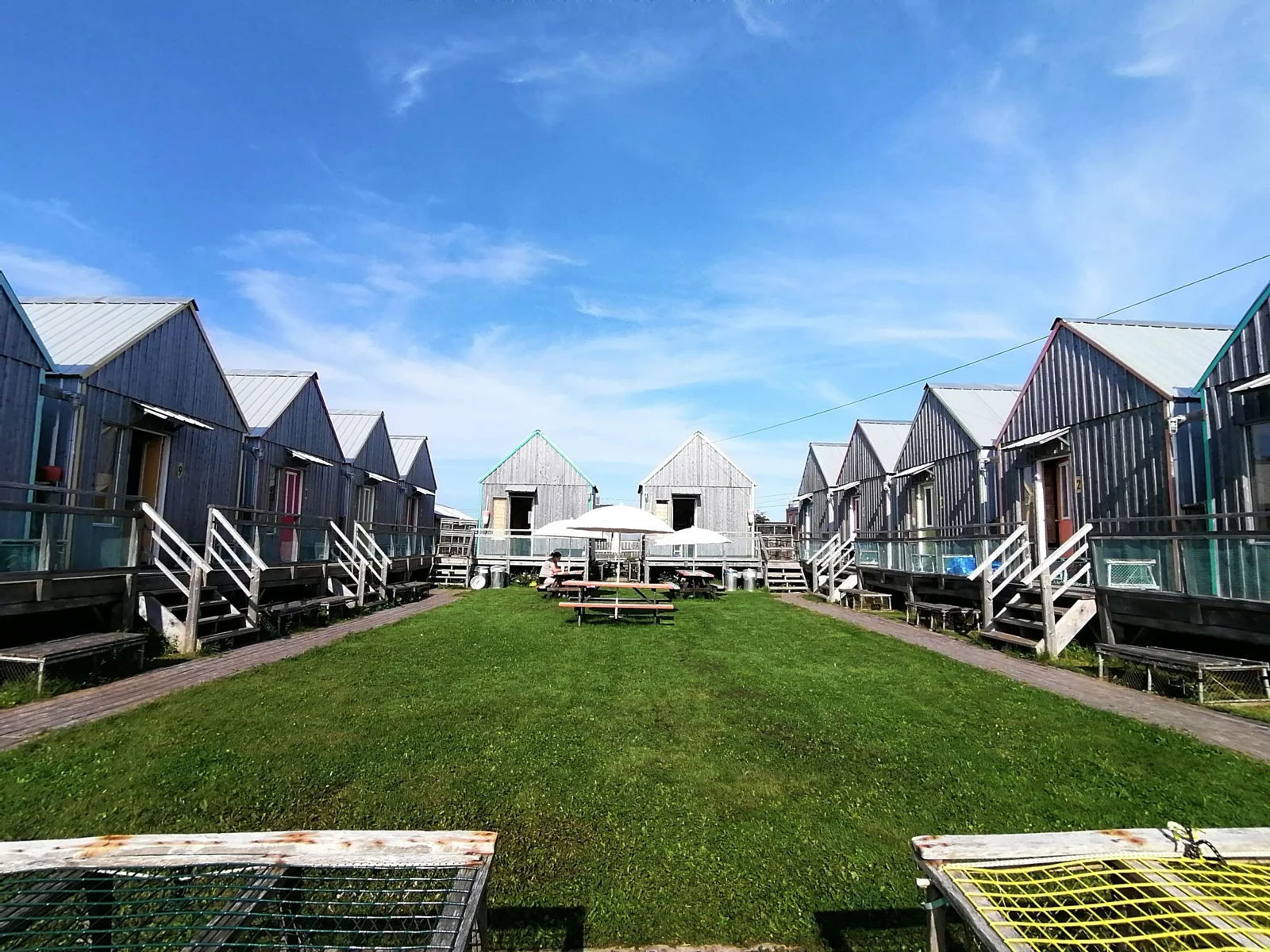 A walkway between coastal cottages
